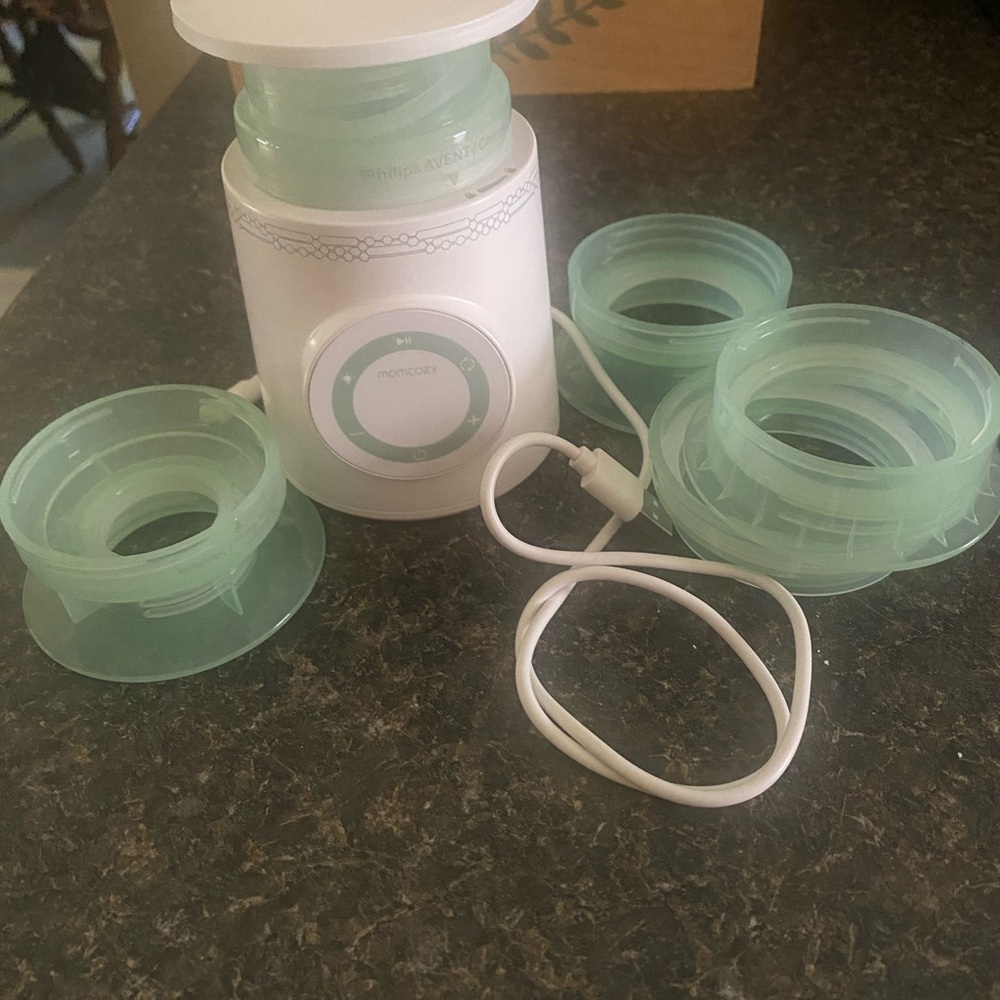 Momcozy portable  Warmer with Accessories
New bottle warmer. Never used.